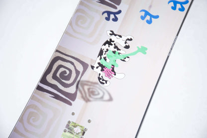 Close-up of the Humble Pi Snowboard's unique graphic design featuring abstract patterns and vibrant colors from Sleep Snowboards.