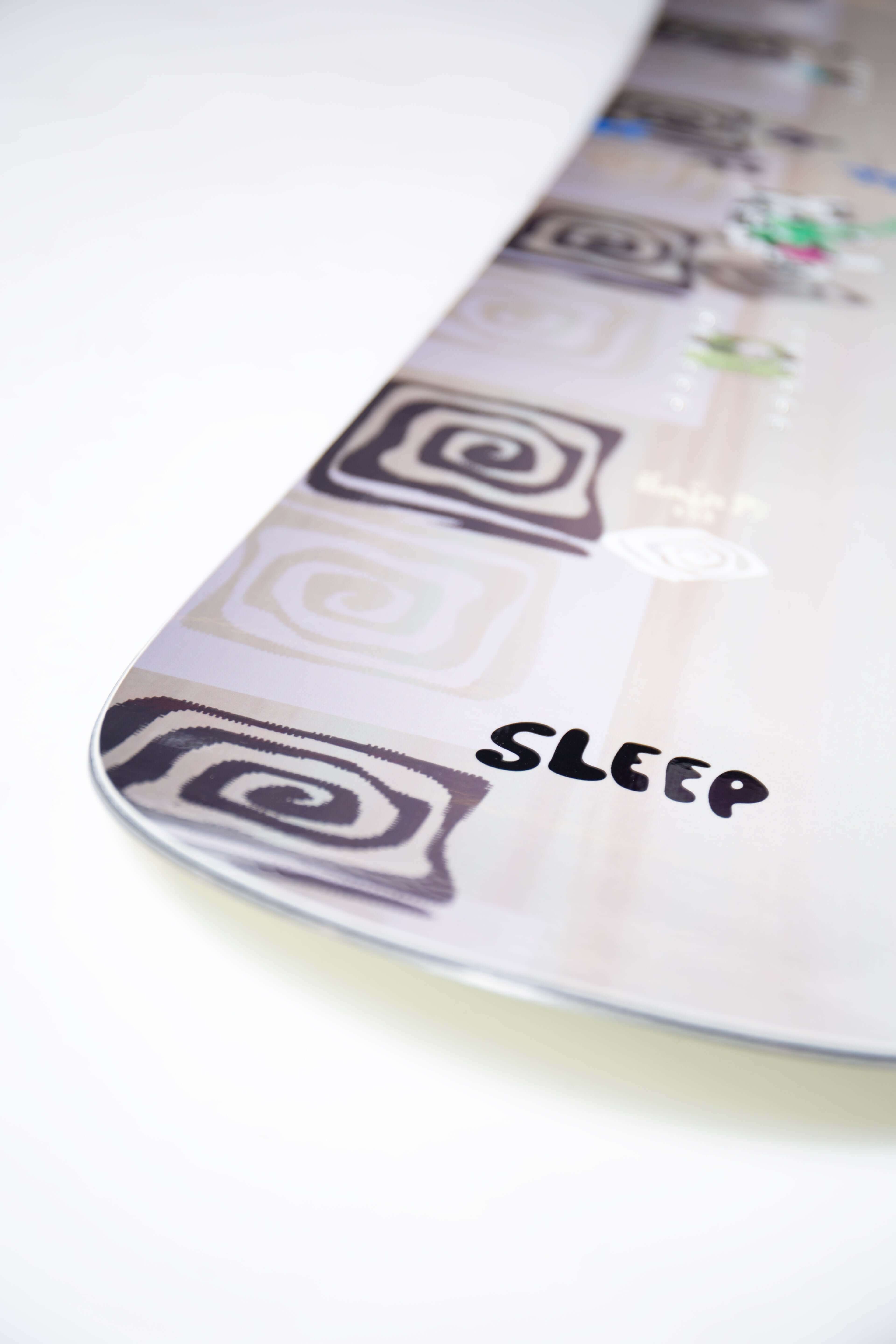 SLEEP HUMBLE Pi Snowboard 152 with unique spiral design on the board's tip, showcasing precision and innovative style.