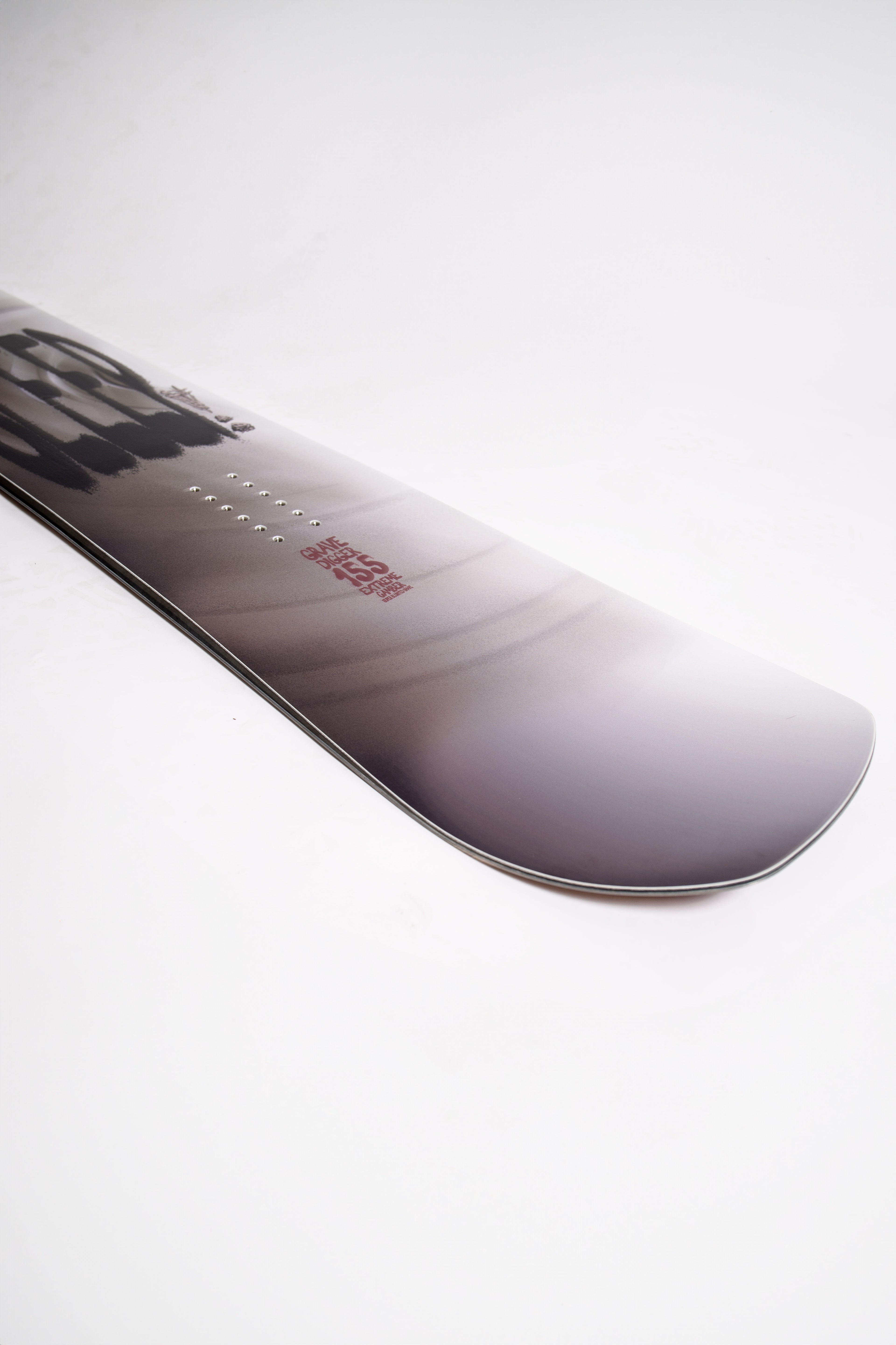 Close-up of SLEEP Grave Digger Snowboard 155 showcasing sleek design with all-mountain twin-tip features.