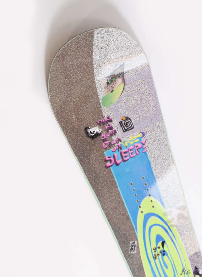 "NiteLite Pro snowboard by Sleep, featuring vibrant design for freestyle enthusiasts seeking performance and precision."