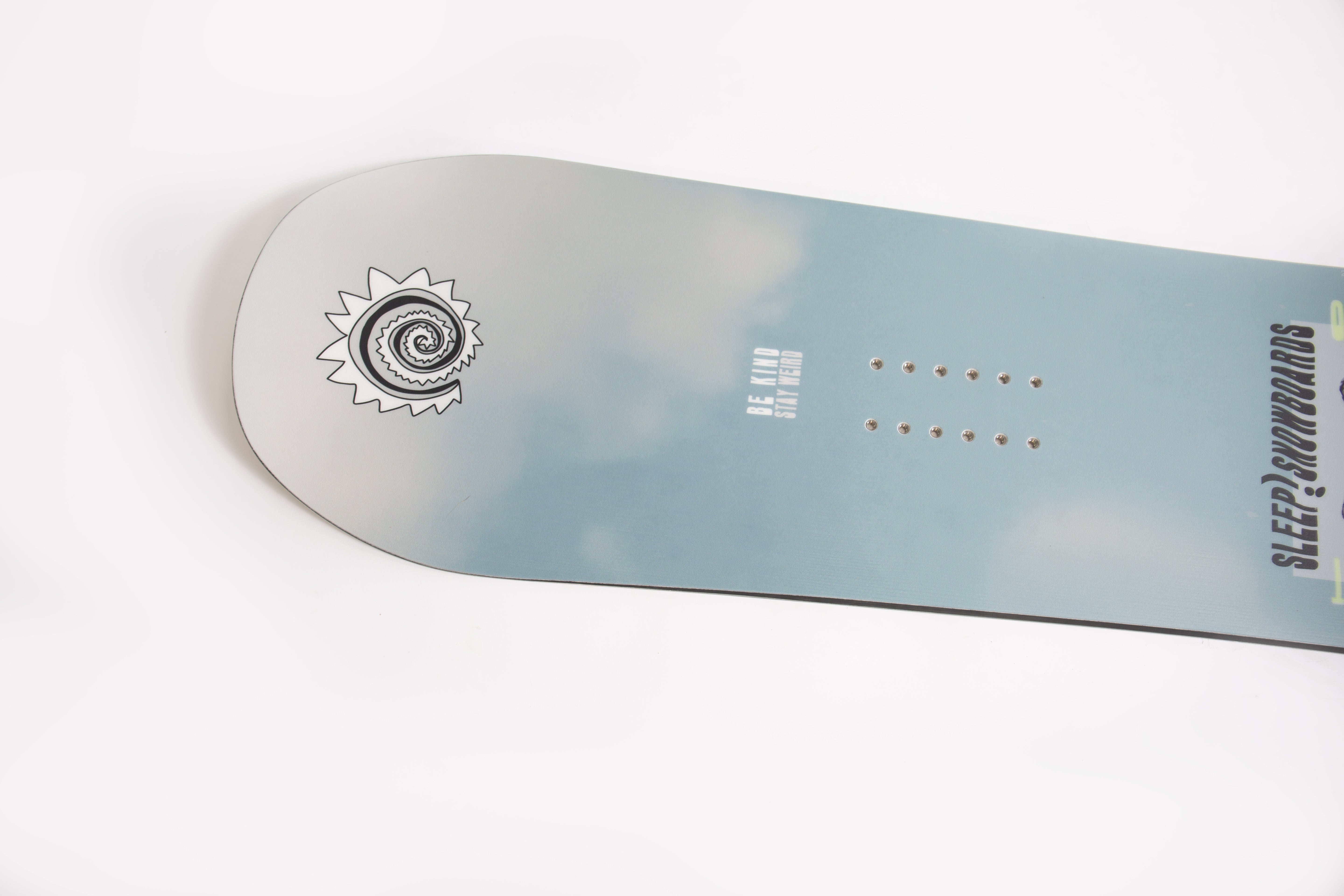 Close-up of SLEEP OFFBEAT SNOWBOARD 146 with unique design, showcasing carbon stringers for enhanced durability and control.